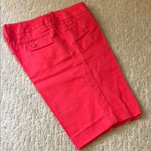 Stretch Bermuda shorts in dark salmon orange color
